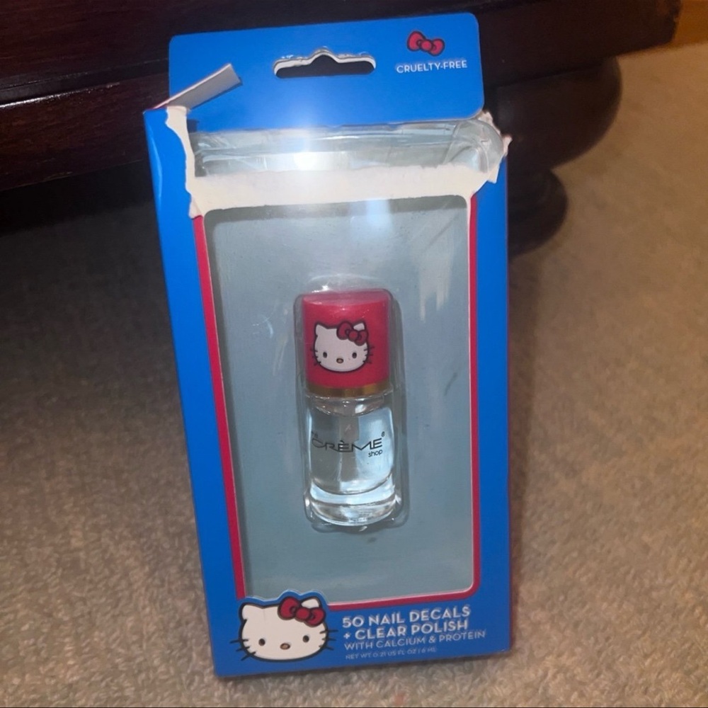 New Hello kitty x cream shoppe clear polish; box is damaged.